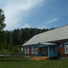 timber house cabin in the Altai Republic mountains
