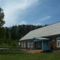 timber house cabin in the Altai Republic mountains