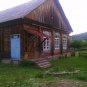 timber house cabin in the Altai Republic mountains