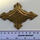 Original antique pressed brass furniture mount mirror cartouche emblem G10