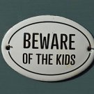 SMALL OVAL ENAMEL METAL BEWARE OF THE KIDS DOOR SIGN PLAQUE