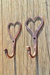 Pair of small solid copper Shaker heart hook American folk art wall door hanger