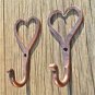 Pair of small solid copper Shaker heart hook American folk art wall door hanger