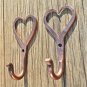 Pair of small solid copper Shaker heart hook American folk art wall door hanger
