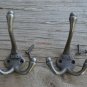 A pair of antique style cast iron 1883 coat hooks triple coathook c/w screws