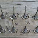 A set of 8 antique style cast iron 1883 coat hooks triple coathook c/w screws
