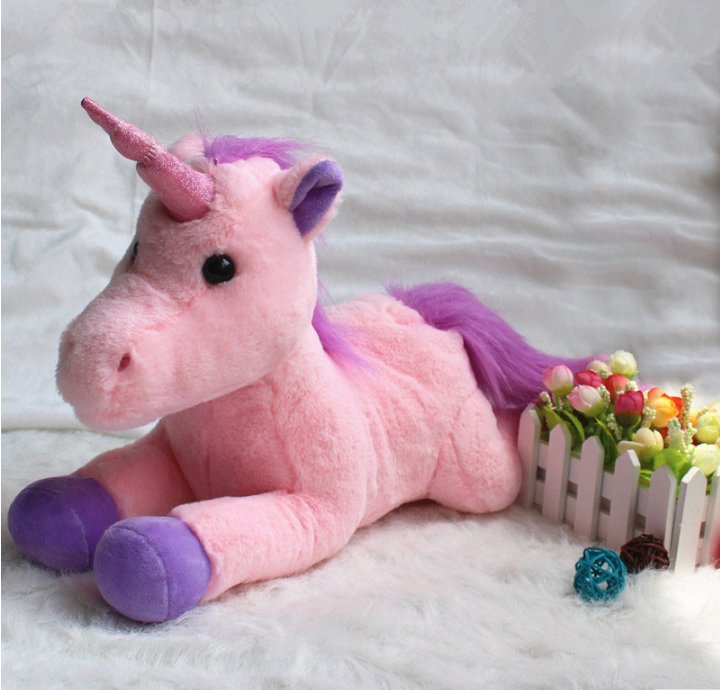 small pink unicorn stuffed animal