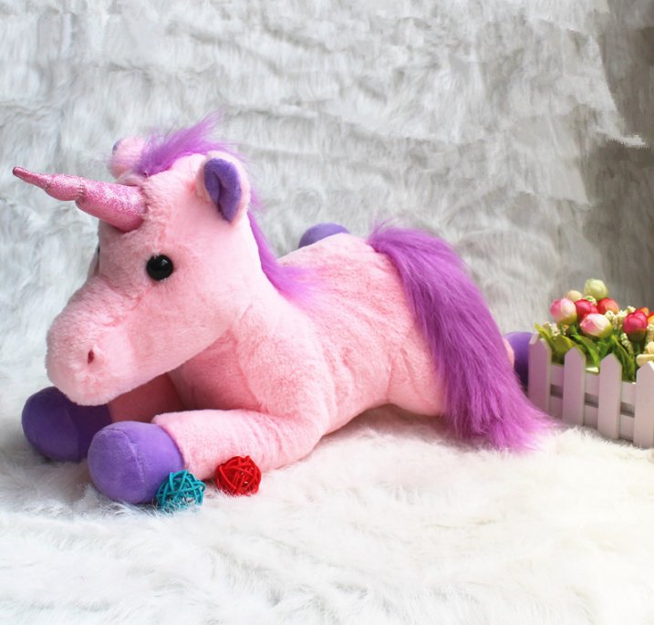 small pink unicorn stuffed animal