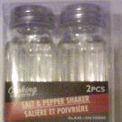 Salt and Pepper Glass shakers with Stainless steel caps New set of 2 Salt and Pepper Glass shakers with Stainless steel caps New set of 2