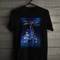 MANNHEIM STEAMROLLER CHRISTMAS EVE BY CHIP DAVID GREEN RED TOUR 2023 FRONT SIDE BLACK TEE ADL01