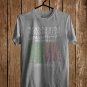 MANNHEIM STEAMROLLER CHRISTMAS EVE BY CHIP DAVID GREEN RED TOUR DATE 2023 FRONT SIDE GREY TEE ADL01