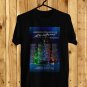 MANNHEIM STEAMROLLER CHRISTMAS EVE BY CHIP DAVID GREEN RED TOUR DATE 2023 FRONT SIDE BLACK TEE ADL01
