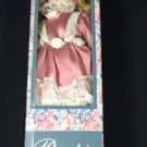 Porcelain Do.l. New In Box. Blonde With Pink And Lace Dress. 14 Inches Tall.
