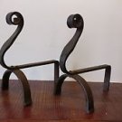 Pair Arts and Crafts bronzed wrought iron fire dogs circa 1900