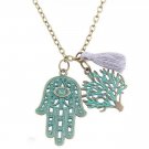 The ancient bronze Life Tree Pendant Necklace has a couple