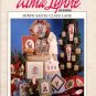 Alma Lynne Designs Down Santa Claus Lane - 31 Designs to Cross Stitch