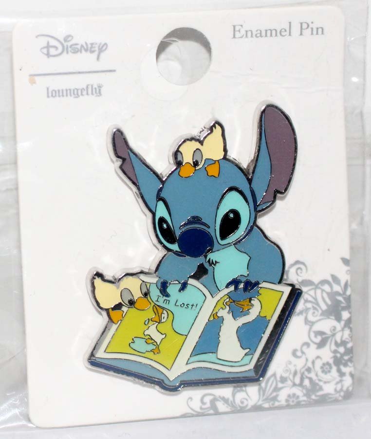 stitch reading a book figurine