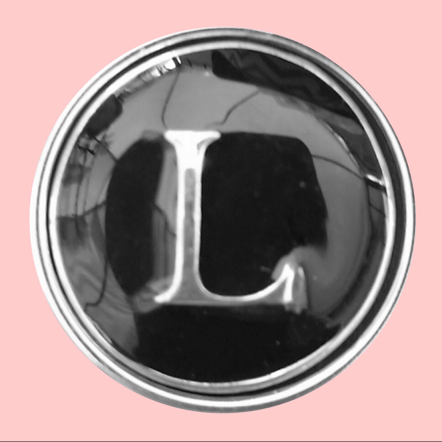 L Initial