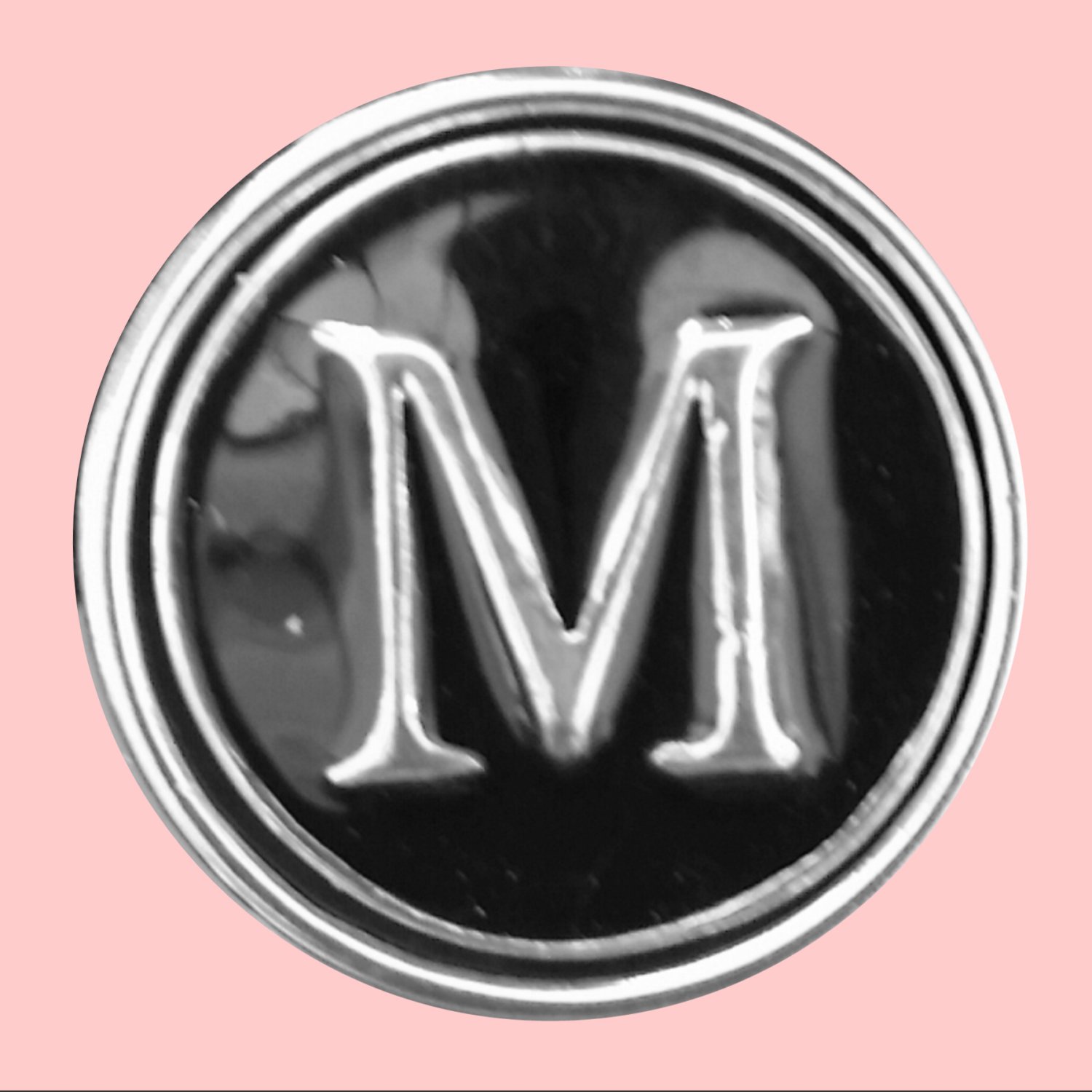 M Initial