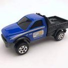 2021 Matchbox #100 2016 Ram Flatbed in Blue Mint on Card GVY10