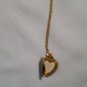 Vintage Gold Like Chain with hearth pendant which opens