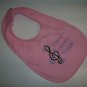 Infant's Bib- "Here Comes Treble"