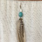 turquoise beaded and large feather earring