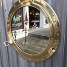 15-INCH HEAVY BRASS SHIP'S PORTHOLE WINDOW MIRROR. GREAT NAUTICAL DECORATIVE! 15-INCH HEAVY BRASS SHIP'S PORTHOLE WINDOW MIRROR. GREAT NAUTICAL DECORATIVE!