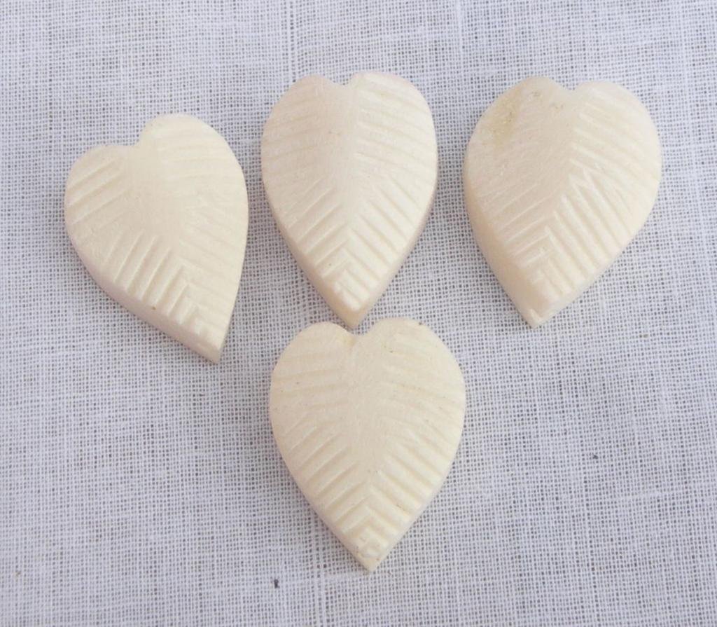 TANPURA FINE TUNNERS HEART SHAPE MADE OF BONE SET OF 4 GSMA015 CA