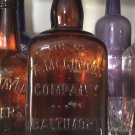 A McGinnis Amber 1890s Quart Whiskey Cork Bottle Baltimore, Maryland 