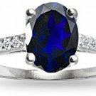 Sterling Silver Created Blue Sapphire And White Topaz Oval Crown Ring, Size 10