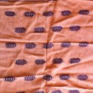 Peachy Orange Table Runner with Purple Decoration