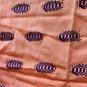 Peachy Orange Table Runner with Purple Decoration
