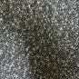 70" wide 1 yard 23" Black Knit with White Specks
