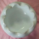 White Bowl with Scalloped Edges and Side Design