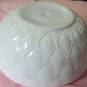 White Bowl with Scalloped Edges and Side Design