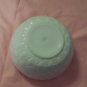 White Bowl with Scalloped Edges and Side Design
