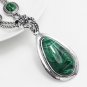 Statement necklace with a natural Malachite center piece