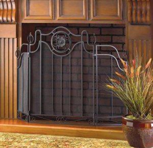 METAL MEDALLION FIREPLACE SCRN