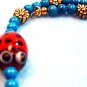 Lady Bug Bracelet, Turquoise Blue Howlite Stone, Large Size Beaded Golden Daisy Bracelet