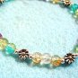 Multi Color Bracelet, Crackle Glass and Silver Flower Stretch Bead Bracelet