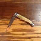 Laguna folder with deer antler handle/brass pins and custom file work.