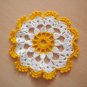 small white yellow doily