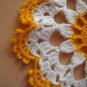 small white yellow doily