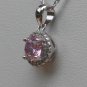 Sterling Silver Circle Pink CZ Pendant and Chain