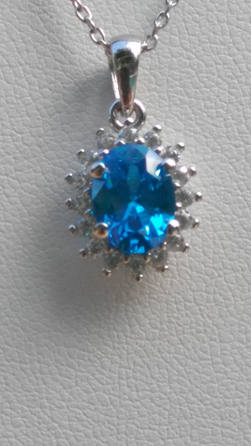 Sterling Silver Oval Blue Topaz CZ Pendant and Chain