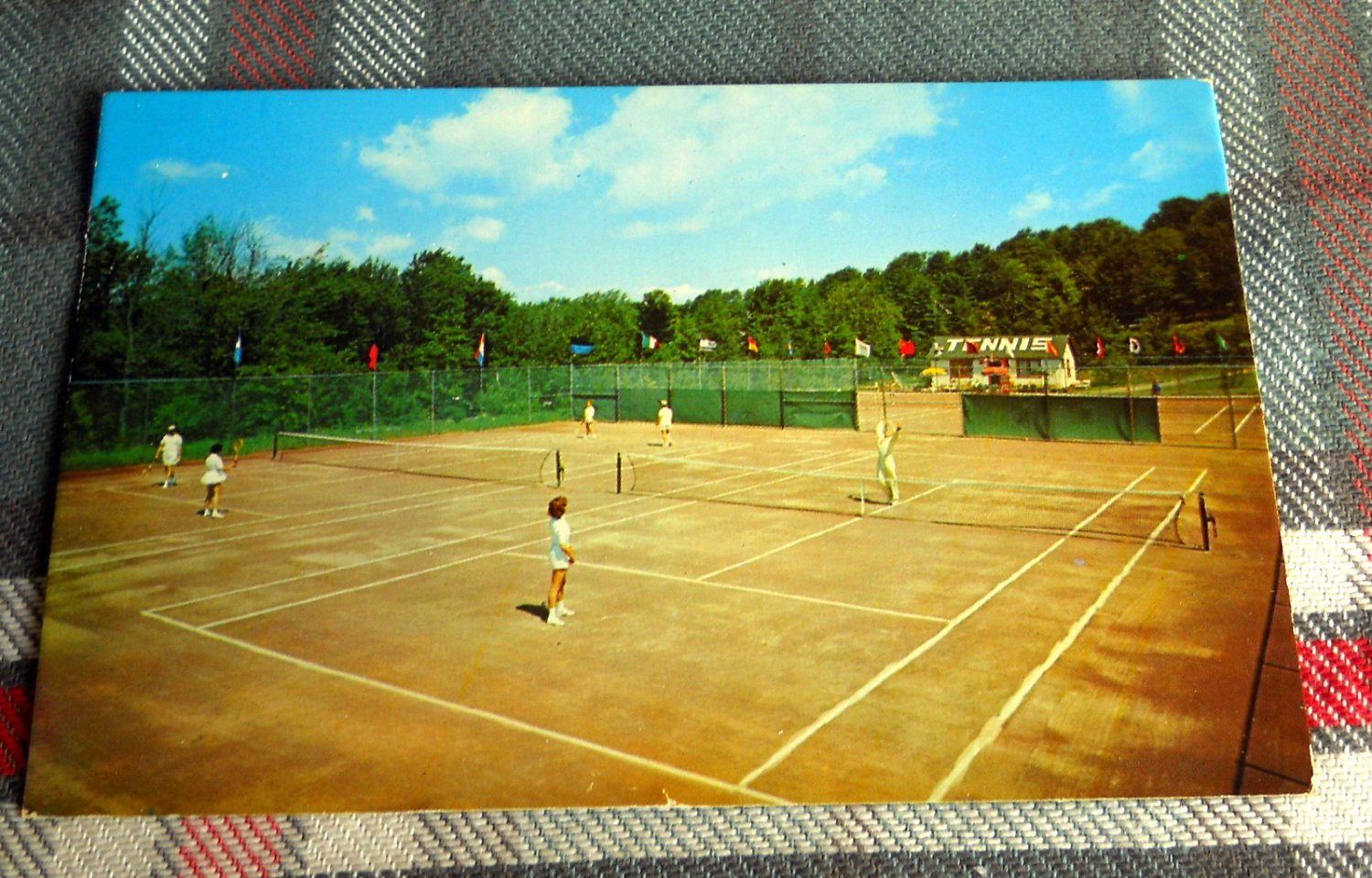 The Concord hotel @ Kiamesha Lake NY *tennis court for swingers? postcard