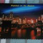 NEW YORK CITY view of city & Brooklyn Bridge at night POSTCARD