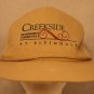 Creekside Retirement Community at Elfindale Tan Dad Trucker Cap Hat Snapback
