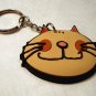 Comic cat face rubber key chain pale orange unused cm1295